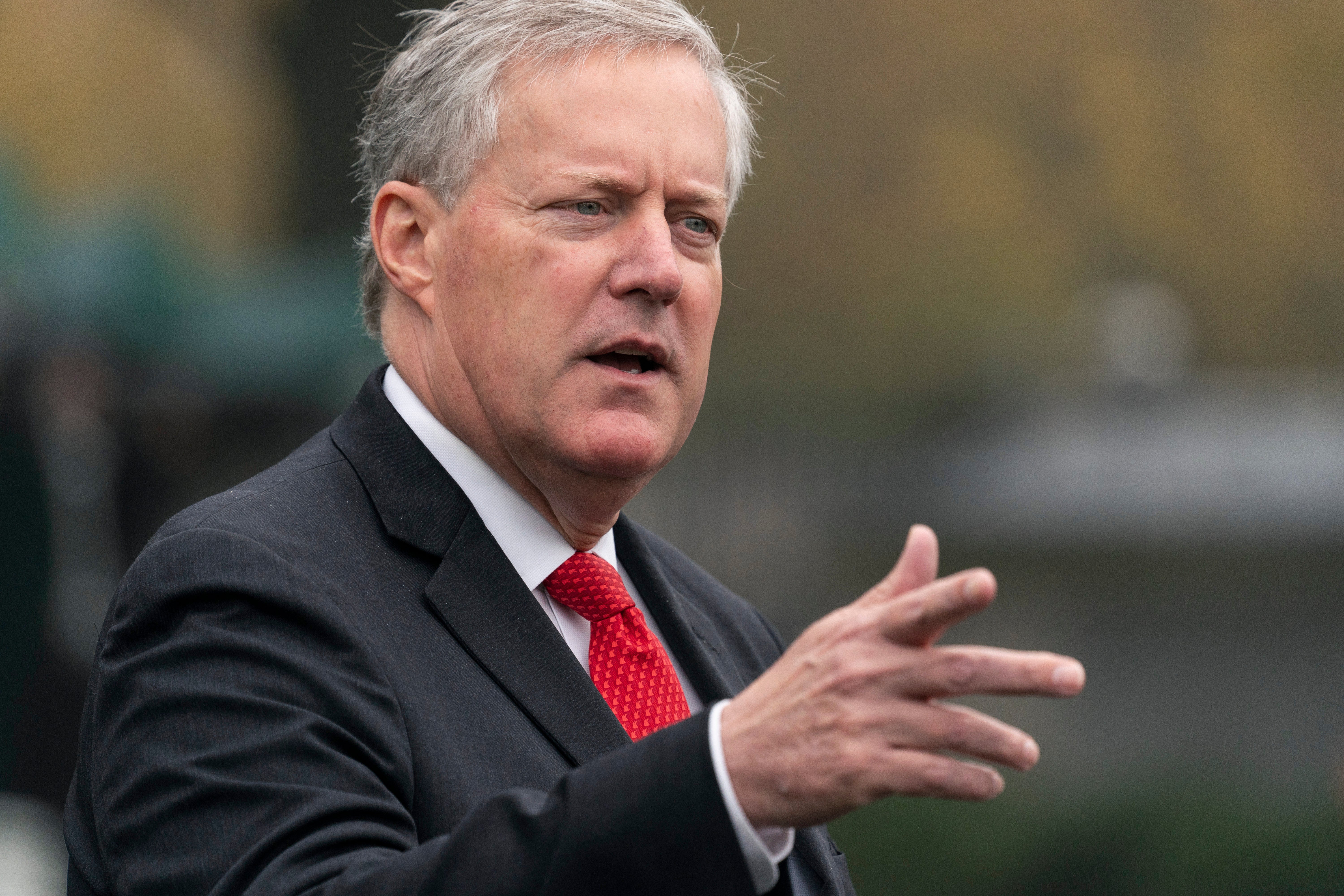 Mark Meadows speaks with reporters at the White House, Oct. 21, 2020, in Washington