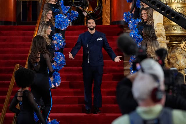 <p>Caleb Williams poses on the red carpet ahead of the first round of the NFL football draft in Detroit </p>