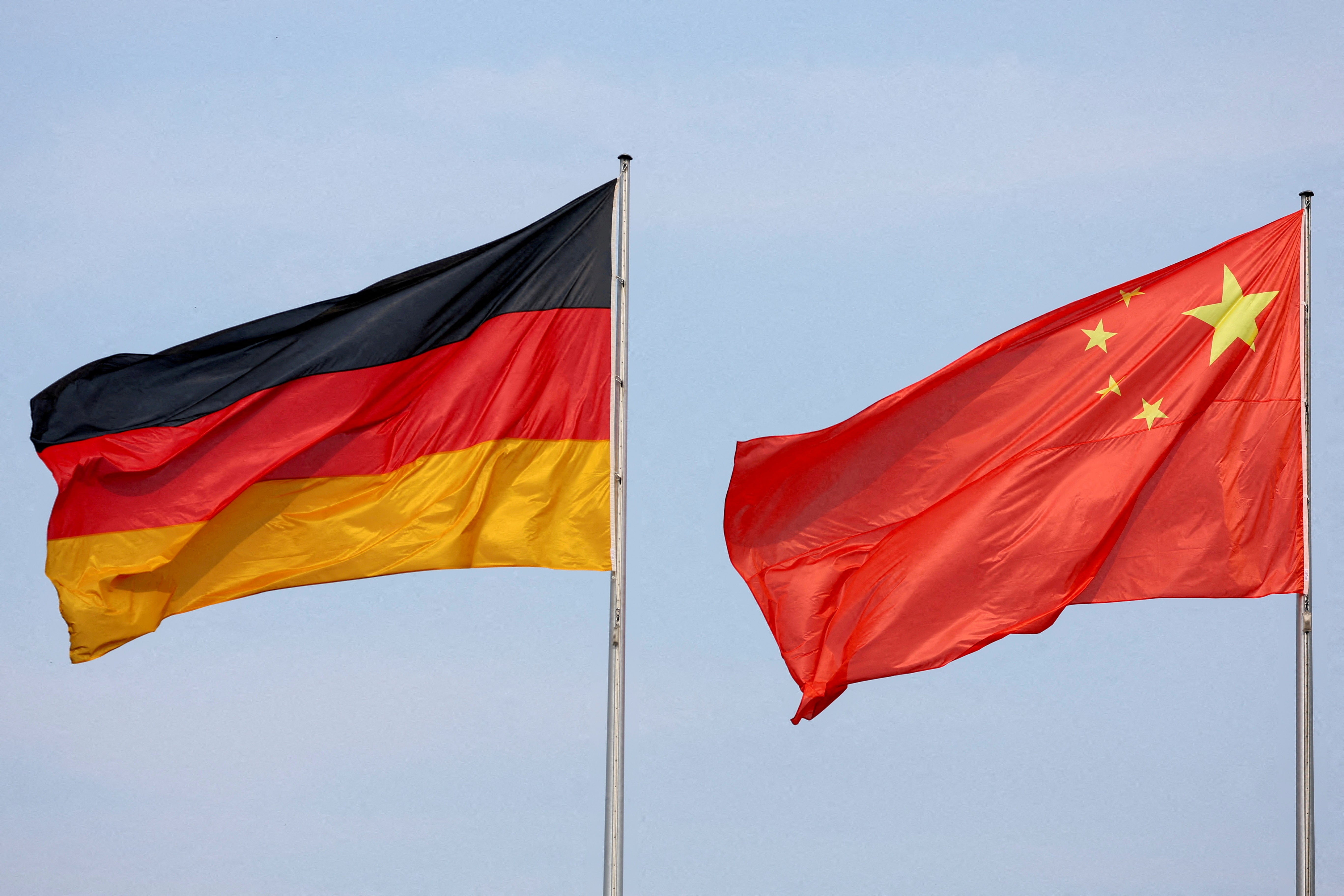 Flags of Germany and China are seen in Berlin
