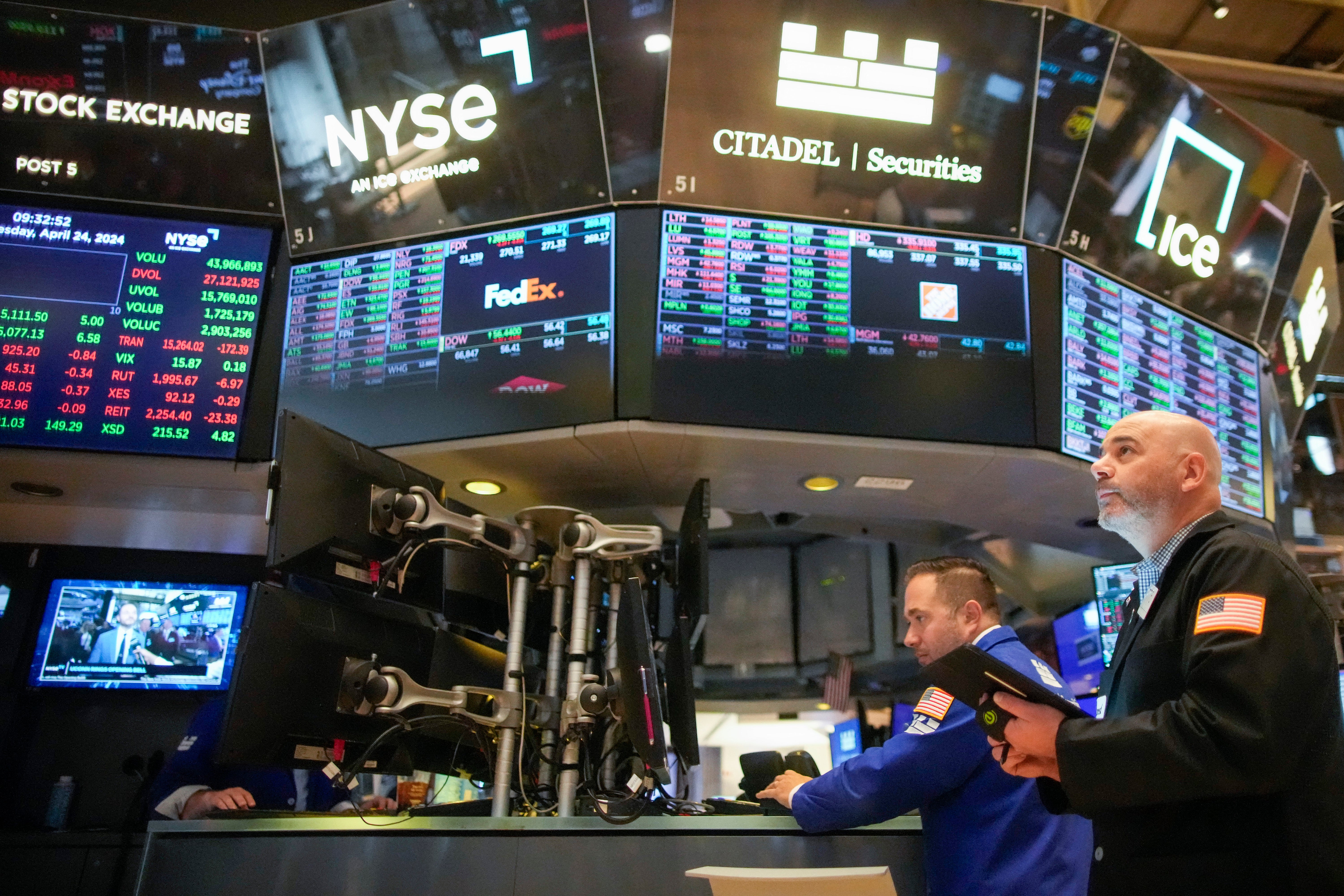 Traders work on the floor of the New York Stock Exchange