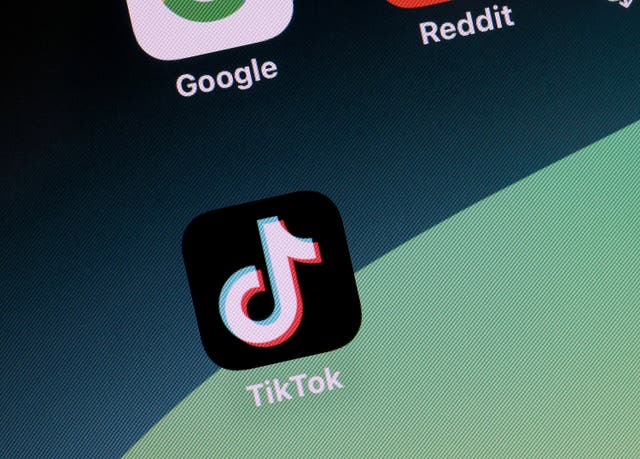<p>In this photo illustration, the TikTok app is displayed on an iPhone screen on April 24, 2024 in Miami, Florida</p>