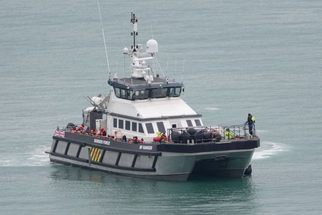 A Border Force vessel carrying migrants (Gareth Fuller/PA)