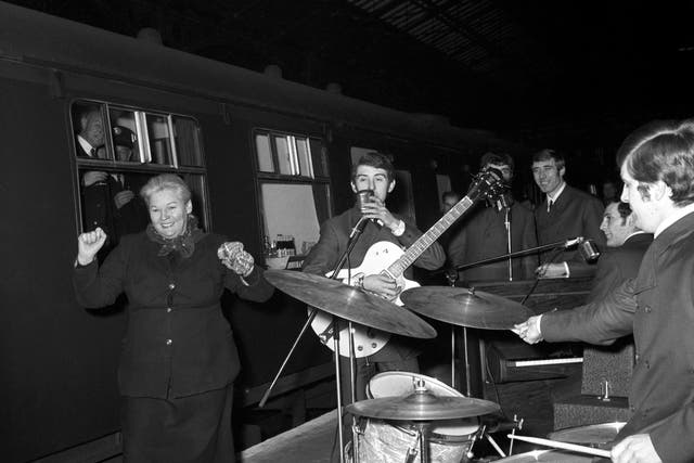 The Moody Blues performing on a train platform (PA)