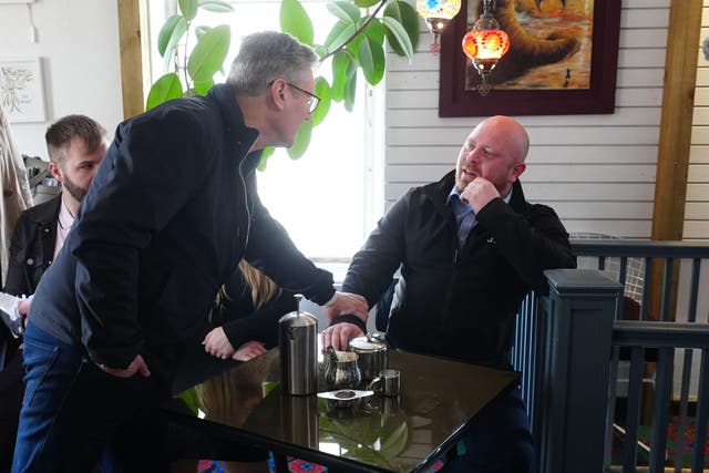 Labour leader Sir Keir Starmer speaking to veterans’ charity founder Dan Smith in Darlington (Owen Humphreys/PA)