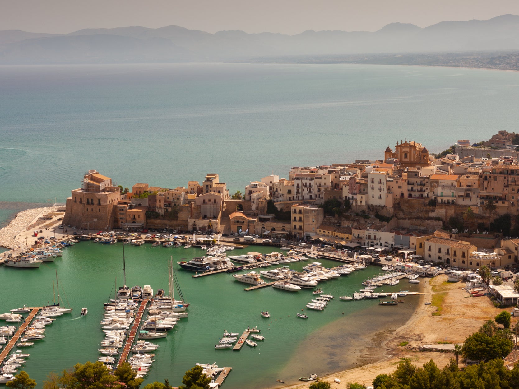Built around an Arab fortress, this port town is a quiet coastal spot
