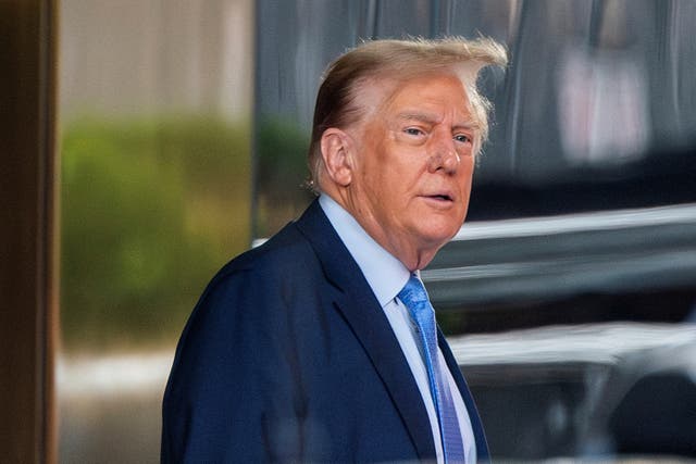<p>Former US president Donald Trump exits Trump Tower to attend his hush money criminal trial on 26 April 2024</p>