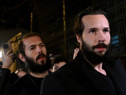<p>Andrew Tate (L) and his brother Tristan were arrested in Bucharest last year</p>