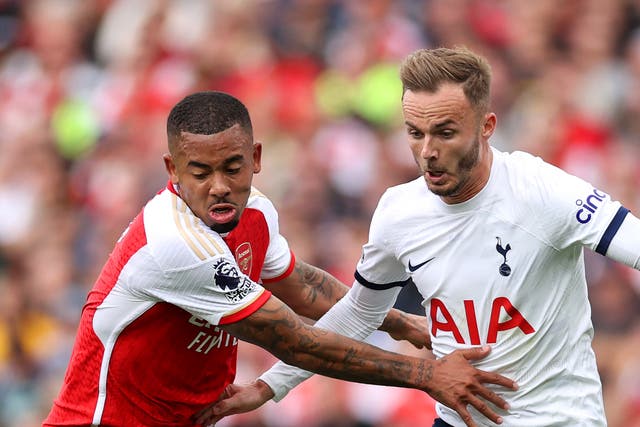 <p>Gabriel Jesus of Arsenal battles for possession with James Maddison of Tottenham Hotspur</p>