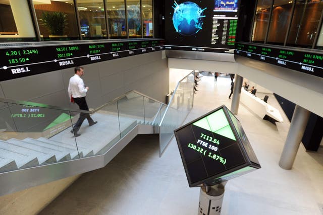 London’s FTSE 100 reached another record closing price on Friday (Nicholas T Ansell/PA)