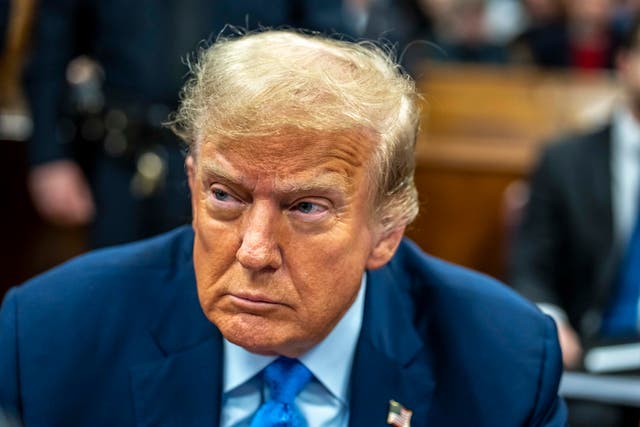 <p>Former US President Donald Trump sits in the courtroom before the start of his hush money trial at Manhattan criminal court in New York</p>