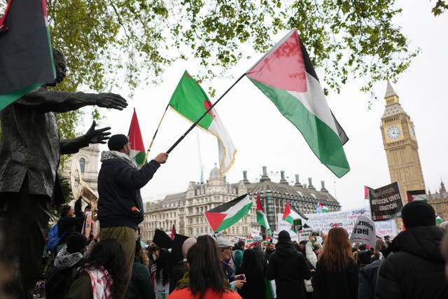 <p>Protesters gather in Parliament Square ahead of a pro-Palestine march in central London</p>