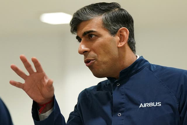 <p>Rishi Sunak talks with workers during a visit to the Airbus factory in Stevenage </p>
