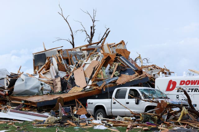 <p>Damage is seen to home after it was leveled by a tornado near Omaha, Neb., on 26 April 2024</p>
