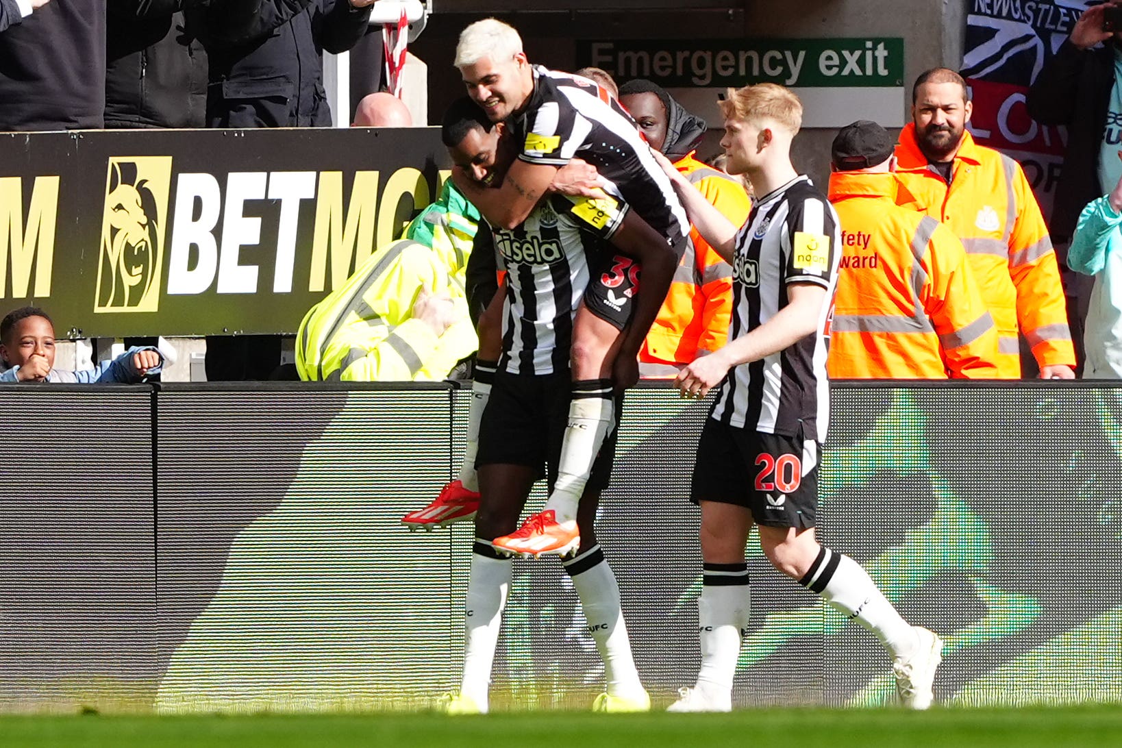 Alexander Isak (left) celebrates scoring Newcastle’s third goal (Owen Humphreys/PA)