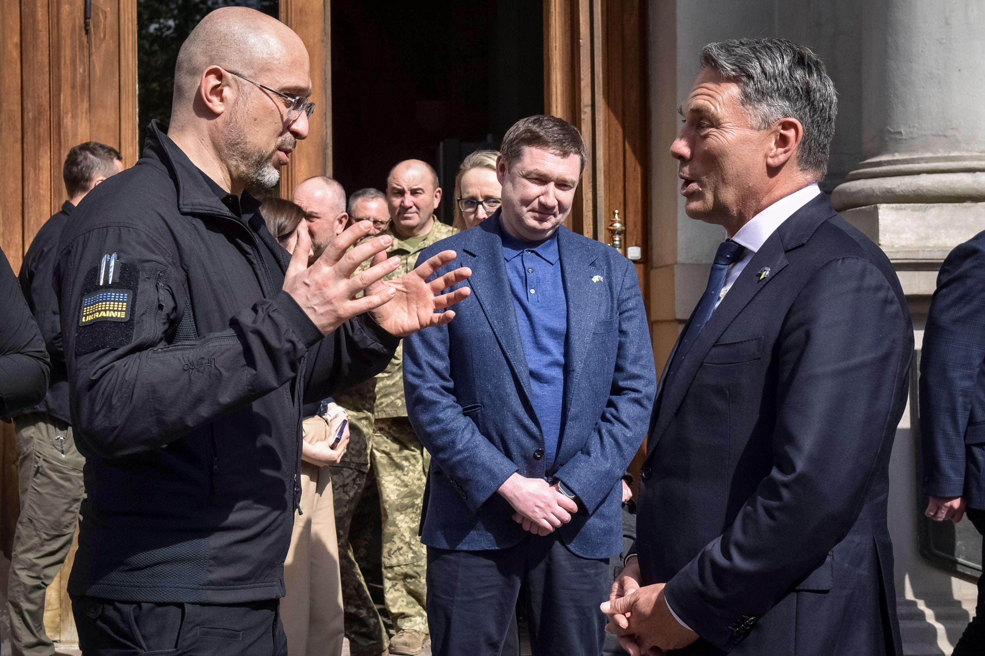 Ukrainian prime minister Denys Shmyhal, left, meets Australian defence minister Richard Marles