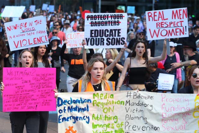 <p>Demonstrators take part in a national rally against violence against women in Sydney</p>
