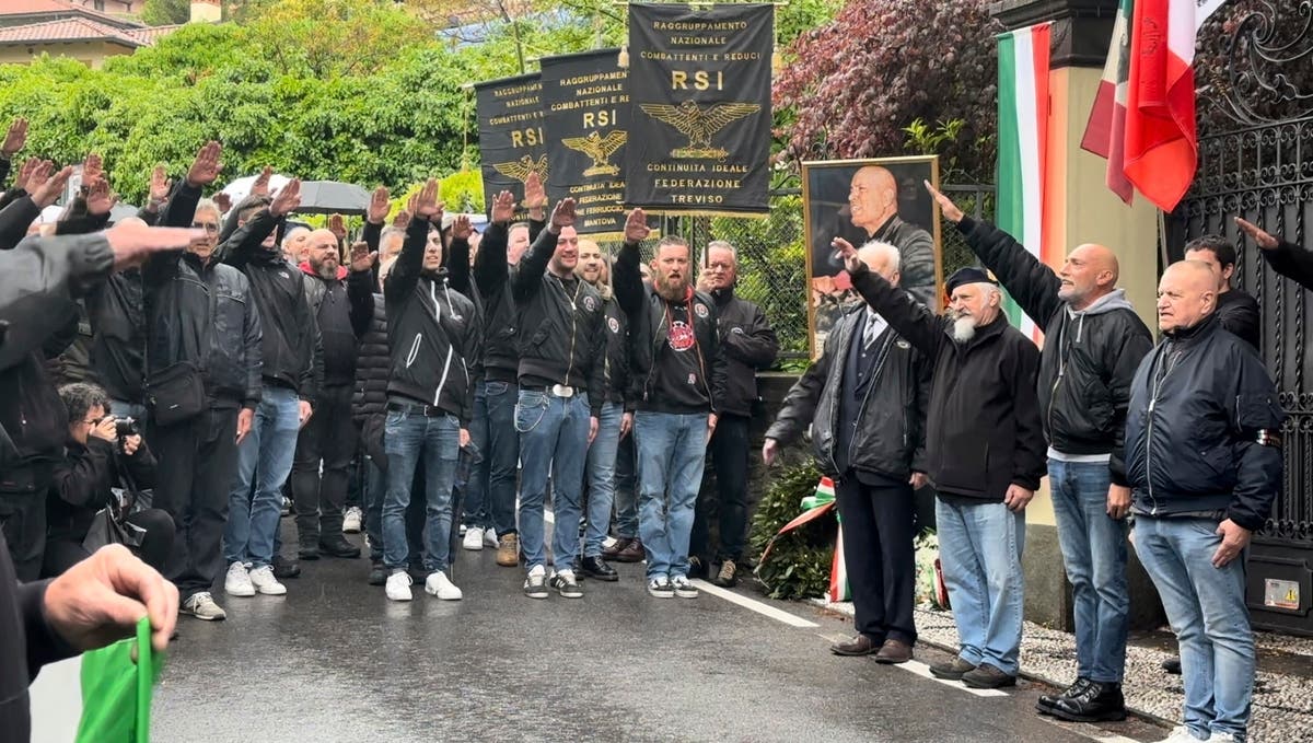 Dozens in Italy give a fascist salute on the anniversary of Mussolini's execution