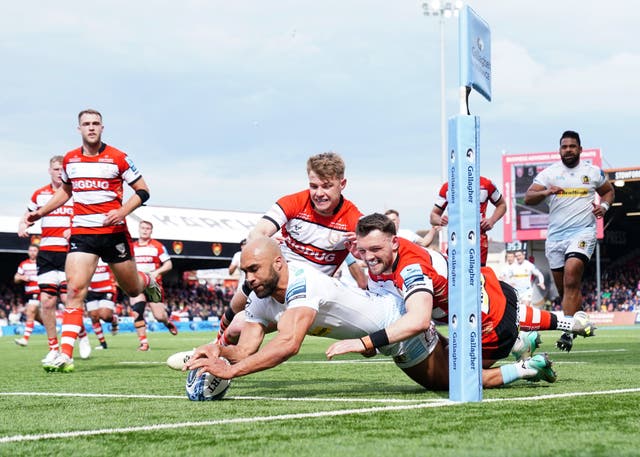 <p>Exeter Chiefs' Olly Woodburn scores their third try </p>