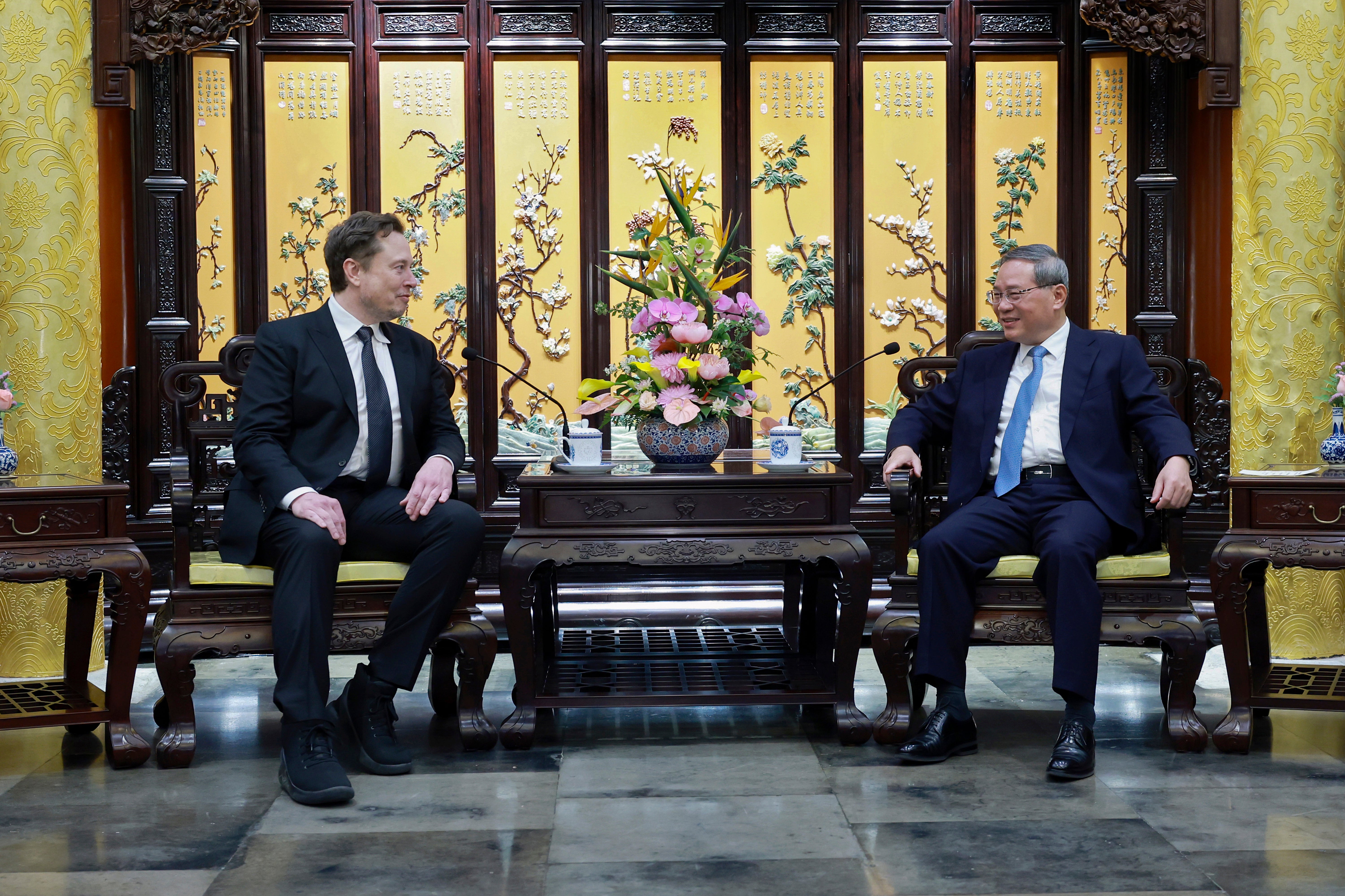 Tesla CEO Elon Musk meets with Chinese premier Li Qiang in Beijing 2024.