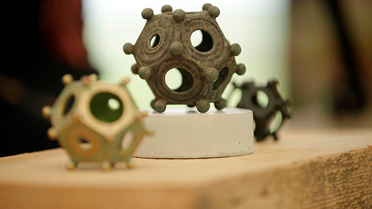 Mystery of ancient Roman dodecahedron baffling experts as it goes on  display in UK | The Independent