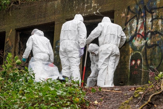 <p>More suspected human remains were discovered on Monday in an alleyway close to railway lines </p>