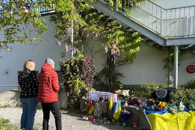 <p>Residents mourn the death of two Ukrainian soldiers in the small southern town of Murnau, Germany</p>