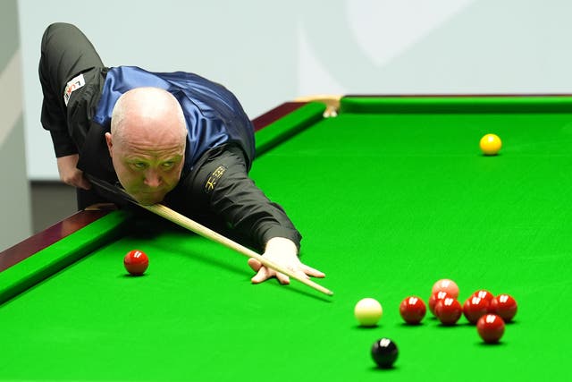 <p>John Higgins trails Mark Allen 9-7 in the World Snooker Championship second round. </p>