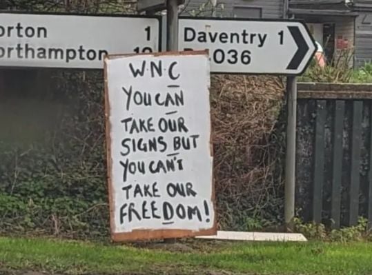 An anonymous pothole campaigner whose tongue-in-cheek signs went viral has claimed victory after the council finally agreed to fix local roads