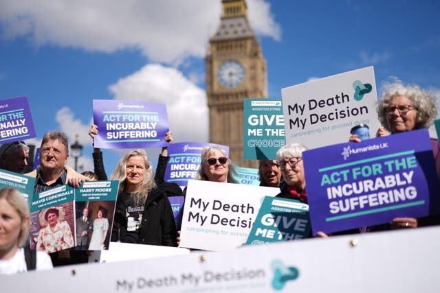 <p>Campaigners gathered outside Parliament as a debate on assisted dying began (Jordan Pettitt/PA)</p>