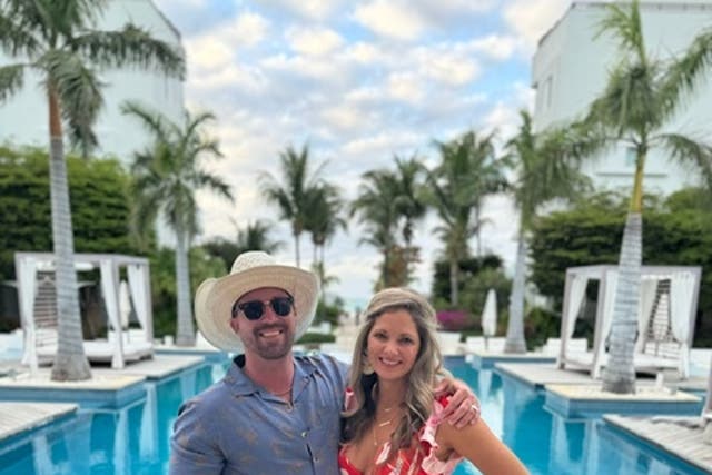 <p>Ryan and Valerie Watson, pictured in Turks and Caicos,  were returning home from vacation in April when they were arrested after airport security found four rounds of hunting ammunition in Mr Watson’s carry-on luggage </p>
