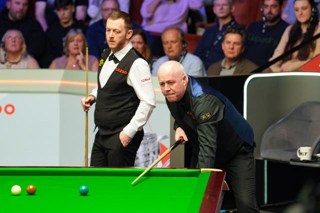 <p>John Higgins, right, trails Mark Allen in the World Snooker Championship second round</p>