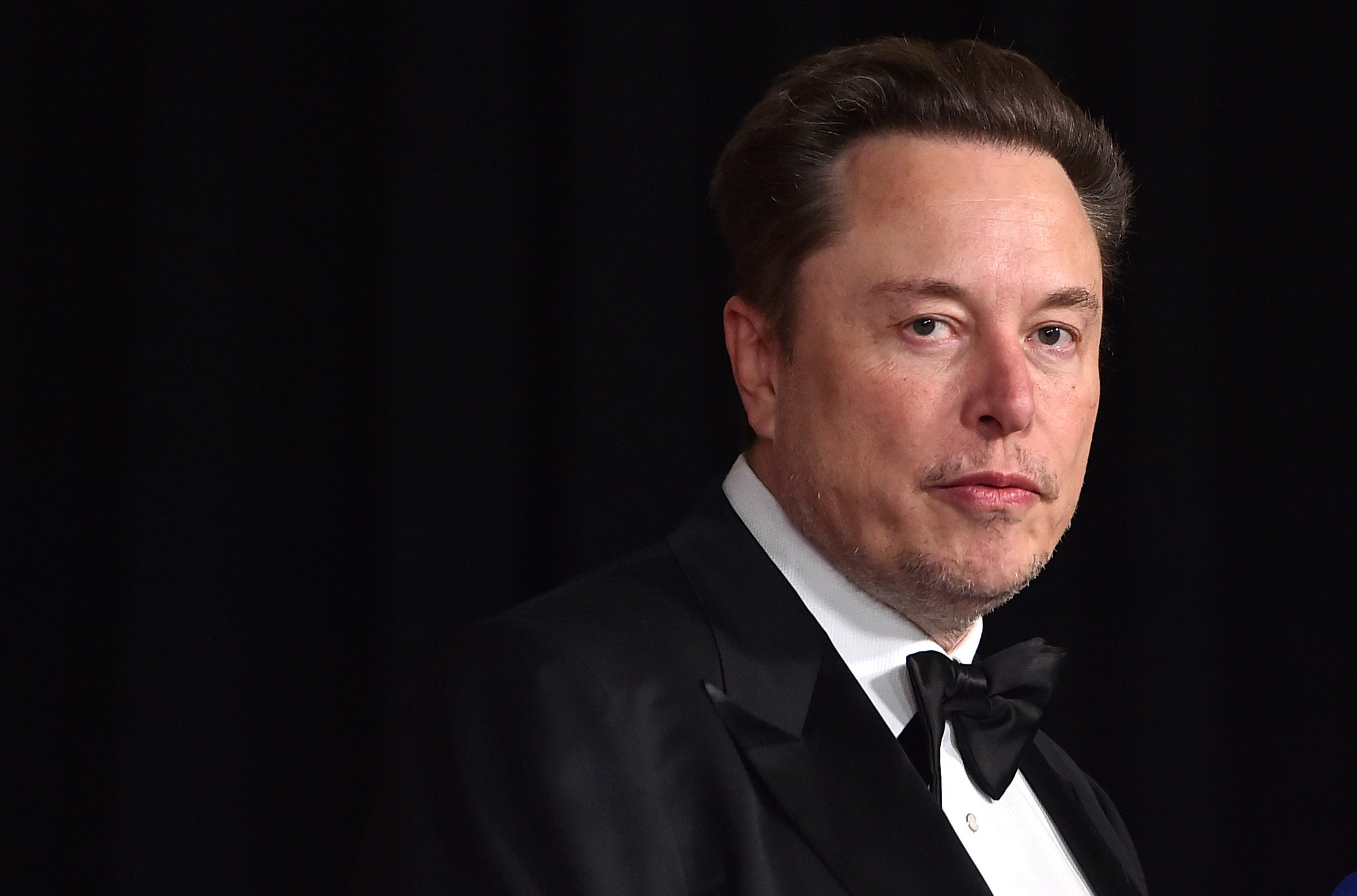 Elon Musk arrives at an event in Los Angeles in April. He also reportedly hosted an ‘anti-Biden’ dinner party in the city last month