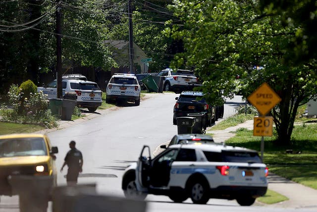 <p>Police work at the scene of a shooting Monday, April 29, 2024, in east Charlotte, North Carolina. Officers from the US Marshals Task Force were conducting an investigation in a suburban neighborhood when they were fired upon, the CMPD said in a post on X</p>