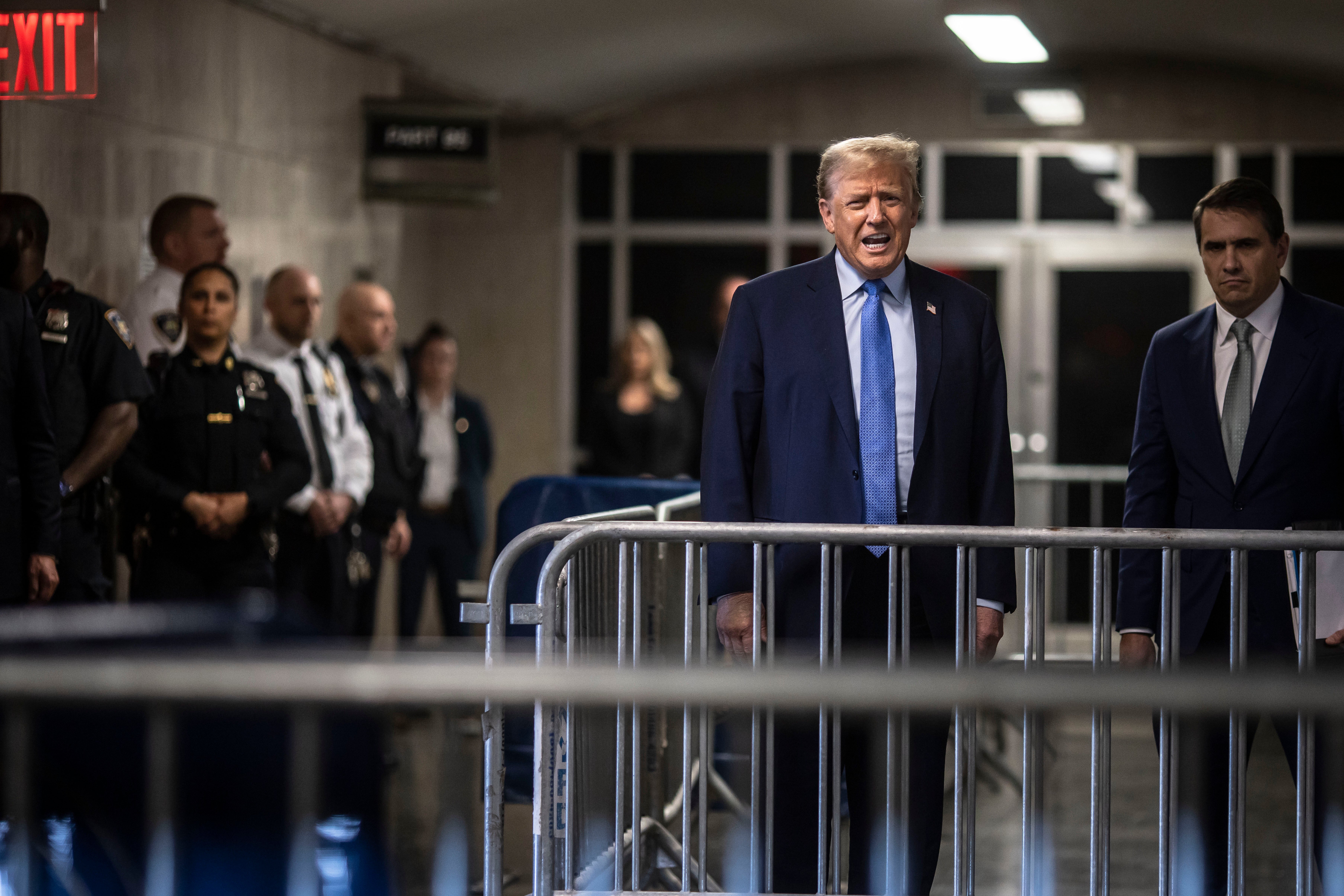 Trump speaks to reporters after leaving a Manhattan courtroom on 26 April