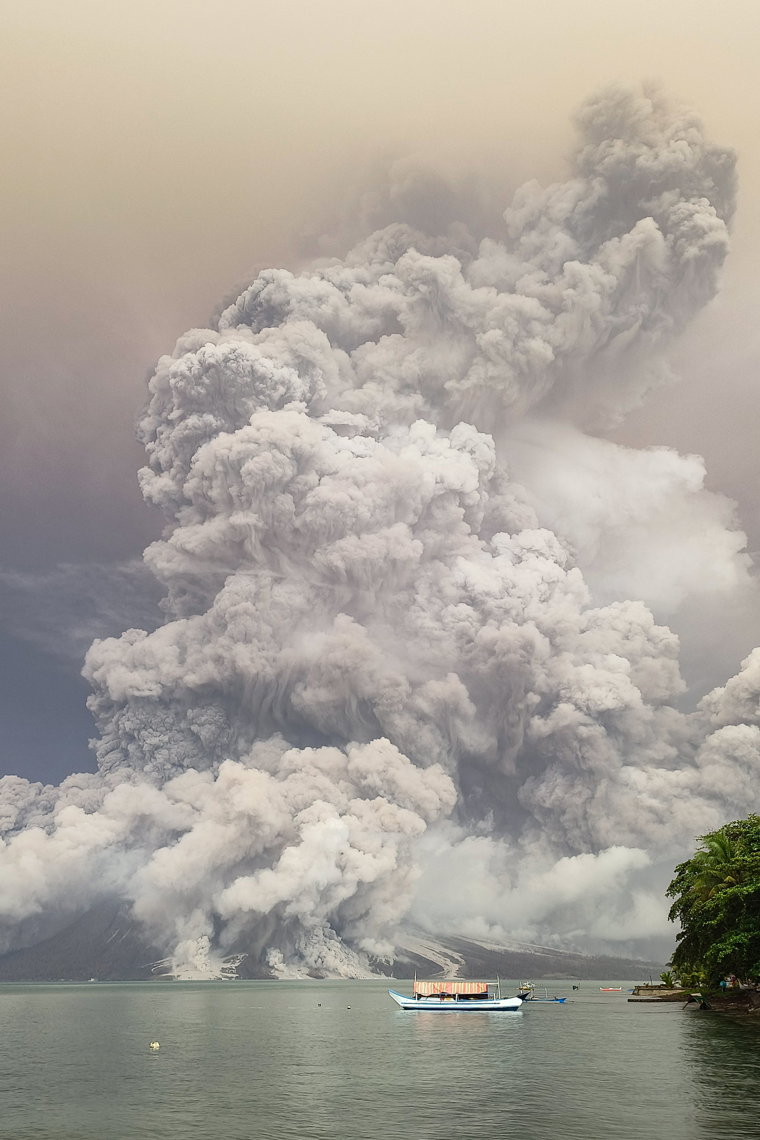 An eruption from Mount Ruang volcano is seen from Tagulandang island in Sitaro, North Sulawesi