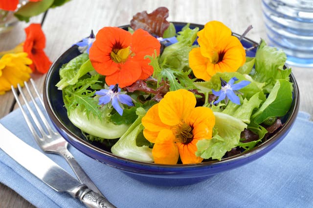 Edible flowers are continuing to grow in popularity (Alamy/PA)