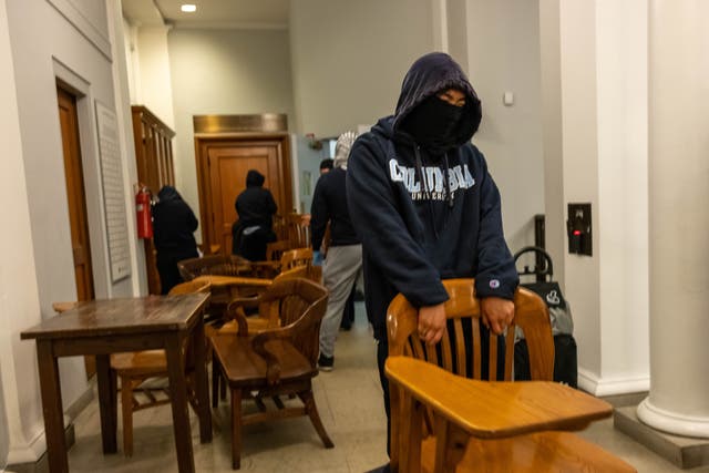 <p>Columbia University student protesters, pictured, barricaded themselves inside a campus building on Monday </p>