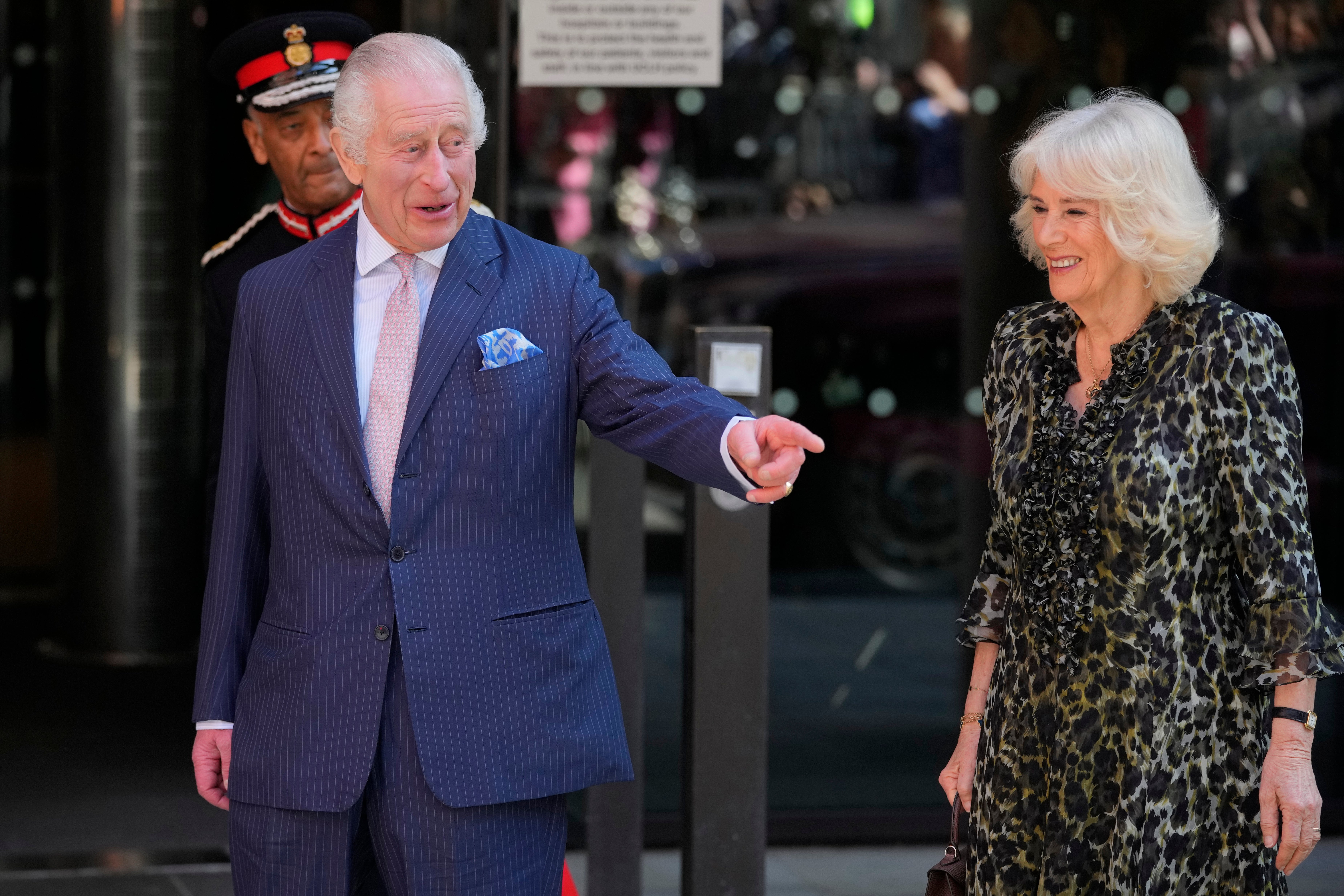 It was all smiles from Charles and Camilla as he returned to work