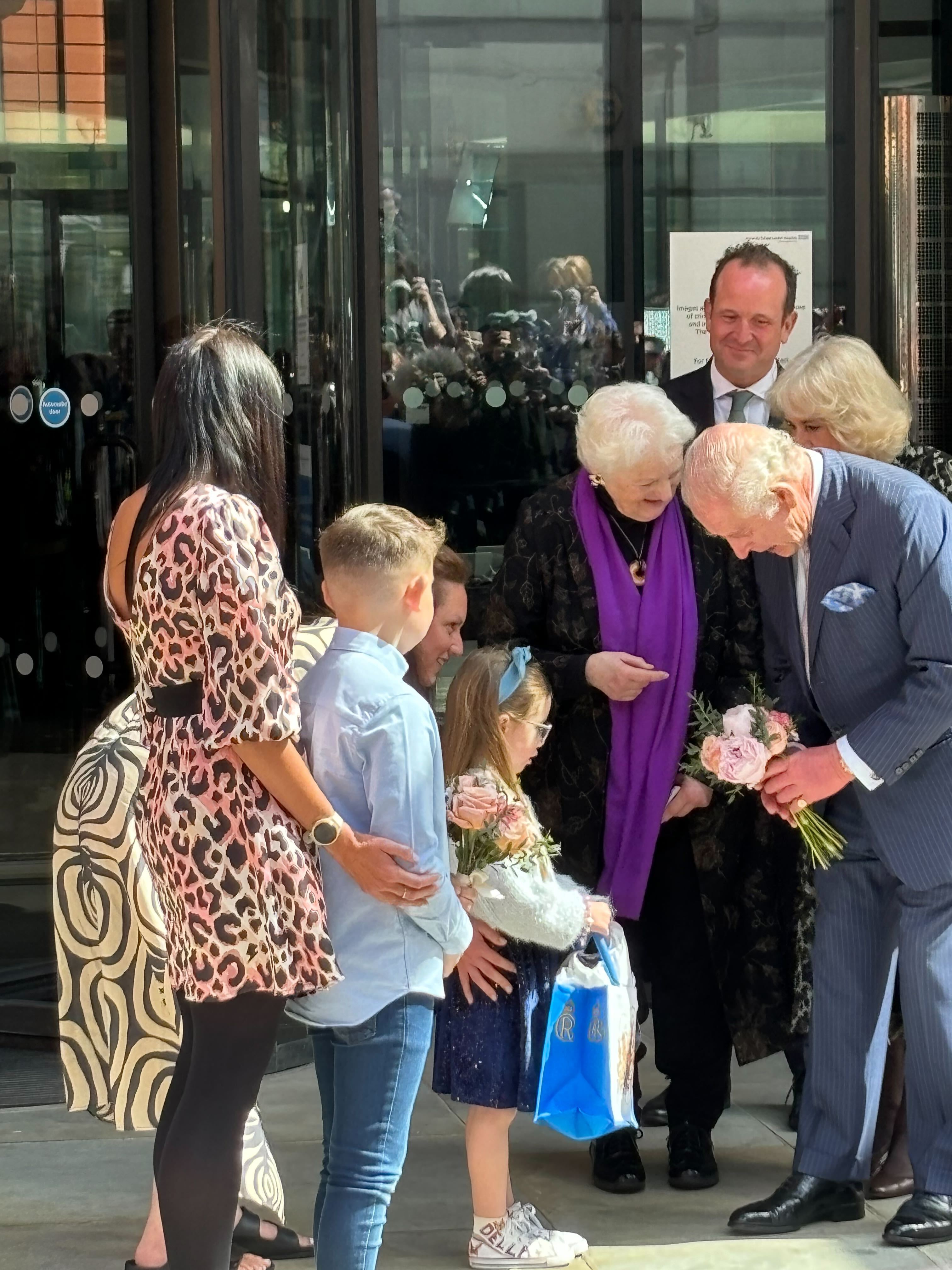 The King and Queen greeted the children who had waited to say goodbye to them