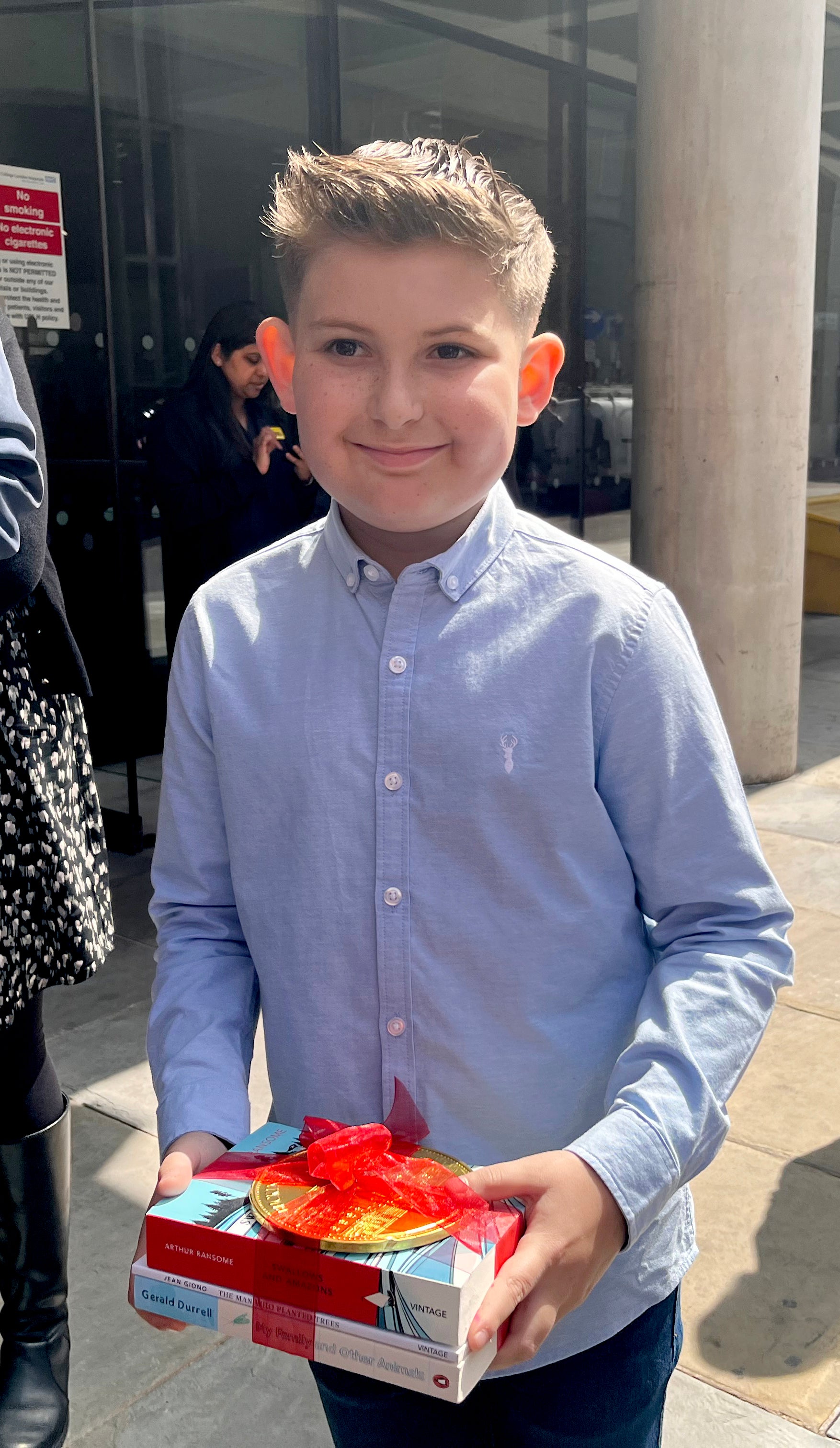 Ellis Edwards, 11, with his gifts from the royal pair