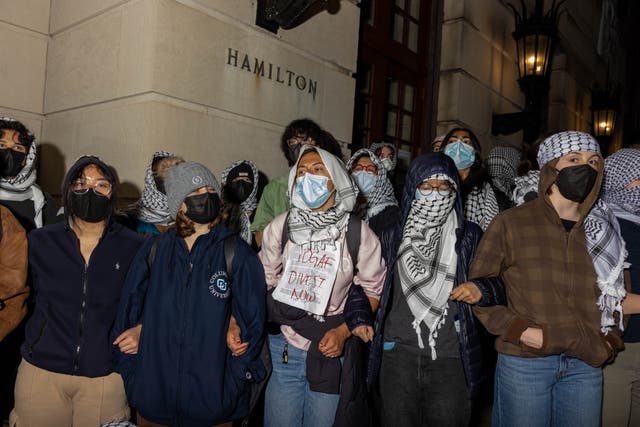 <p>Activists and legal experts say mask bans could expose protesters to violent police interactions, threat immunocompromised people, and silence pro-Palestinian activism.  </p>