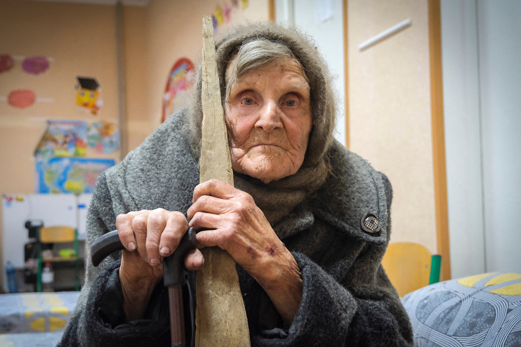 Lidia Lomikovska fled her house in the village of Ocheretyne on foot after a bombardment