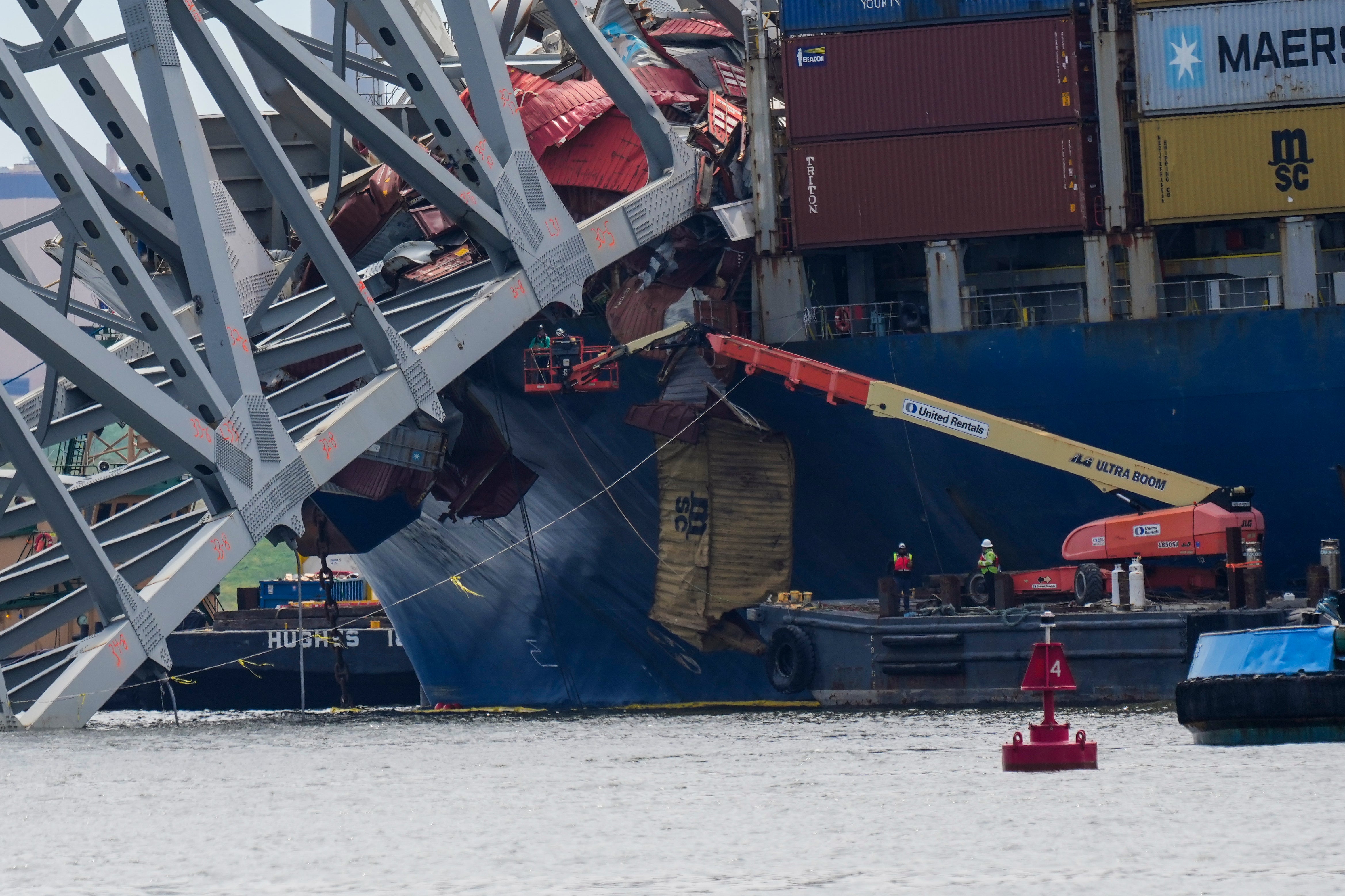 Salvage workers have continued to remove the large pieces of debris a month after the bridge collapsed in Baltimore