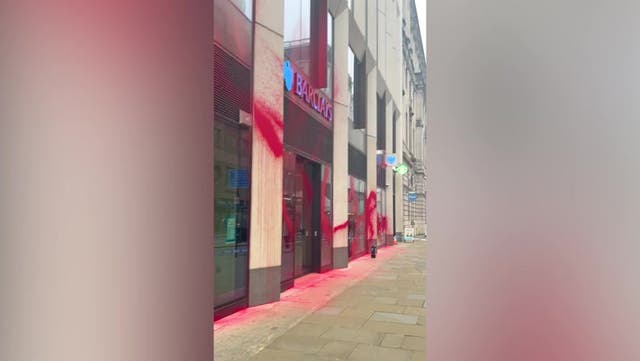 <p>Barclays London office cordoned off as pro-Palestine protesters spray red paint.</p>