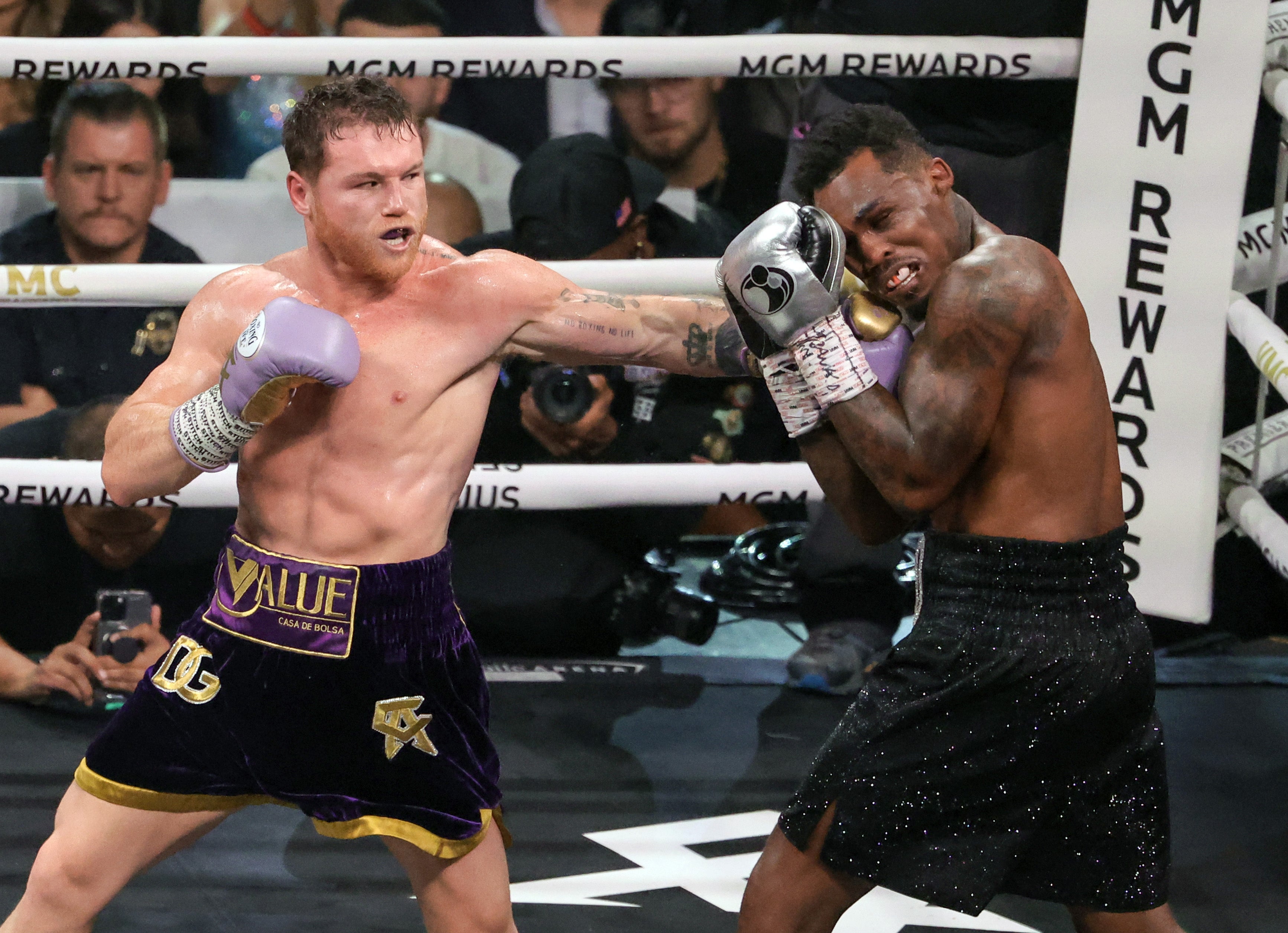 Alvarez throws a left at Jermell Charlo during their super-middleweight title fight in Nevada in September 2023