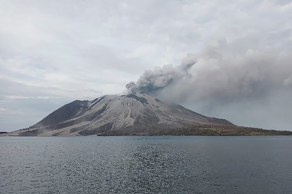 Indonesia’s Ruang volcano spews more hot clouds after eruption forces closure of airports