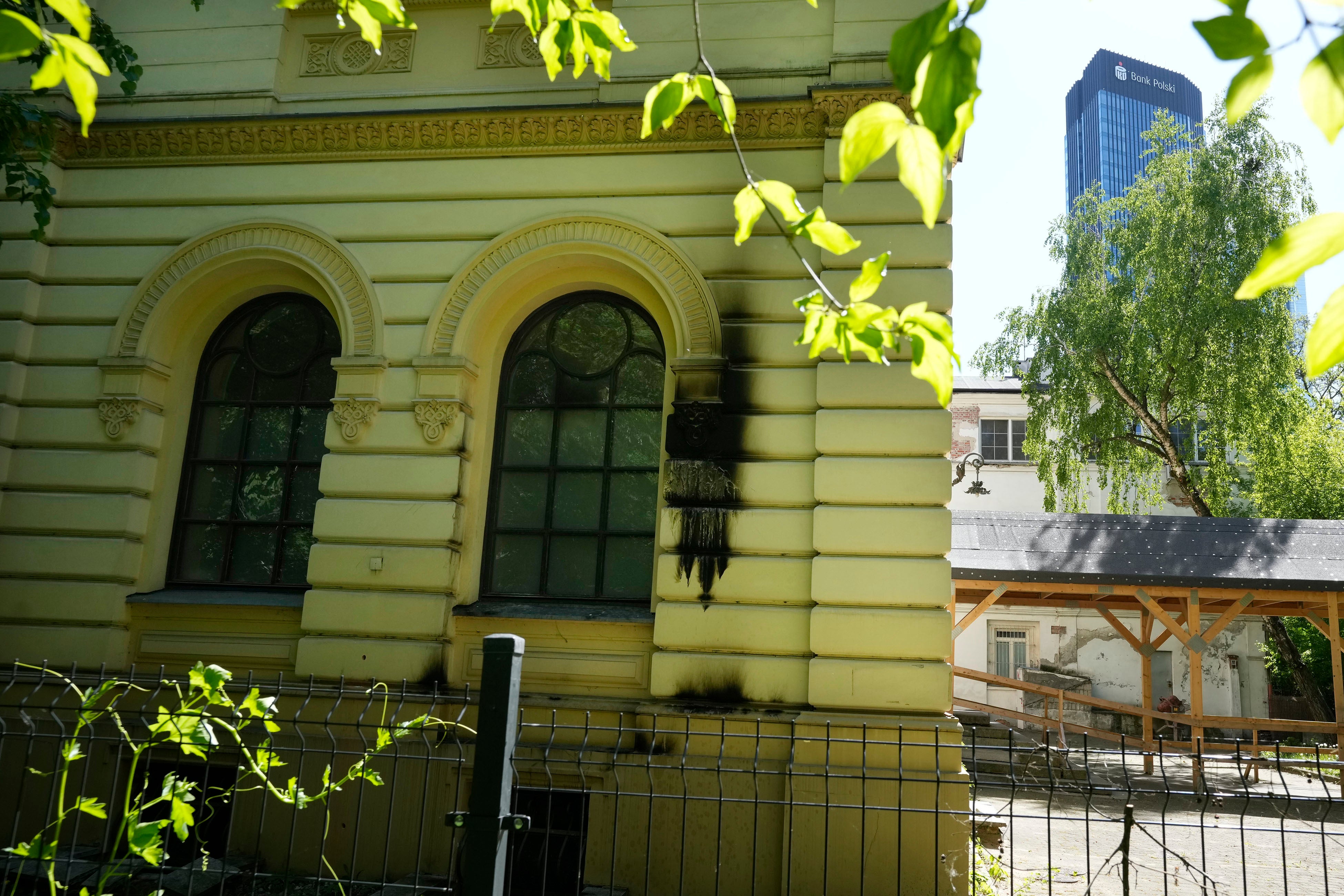 Damage from the firebombs is visible on a synagogue wall