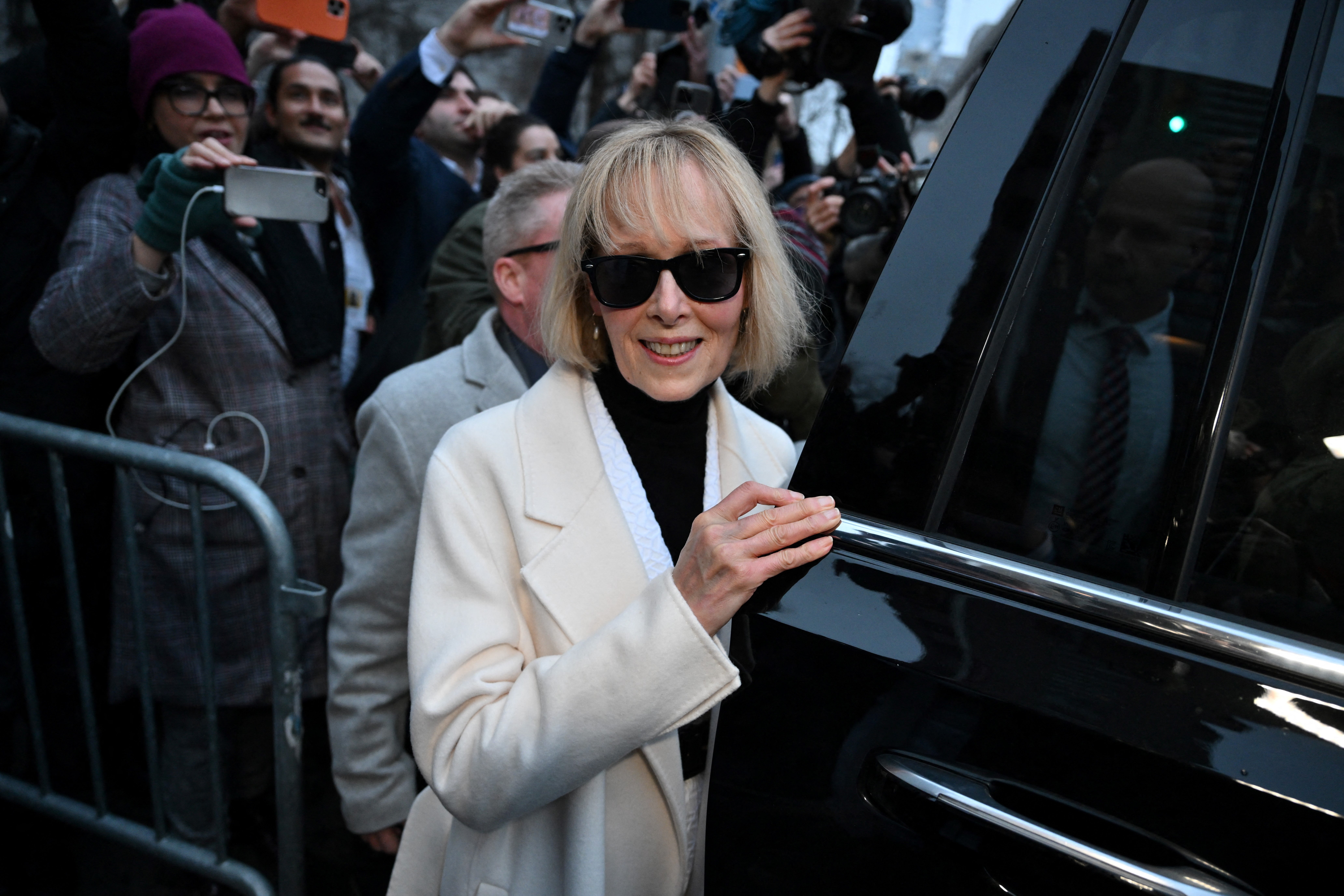 Writer E Jean Carroll leaves federal court on 26 January 2024