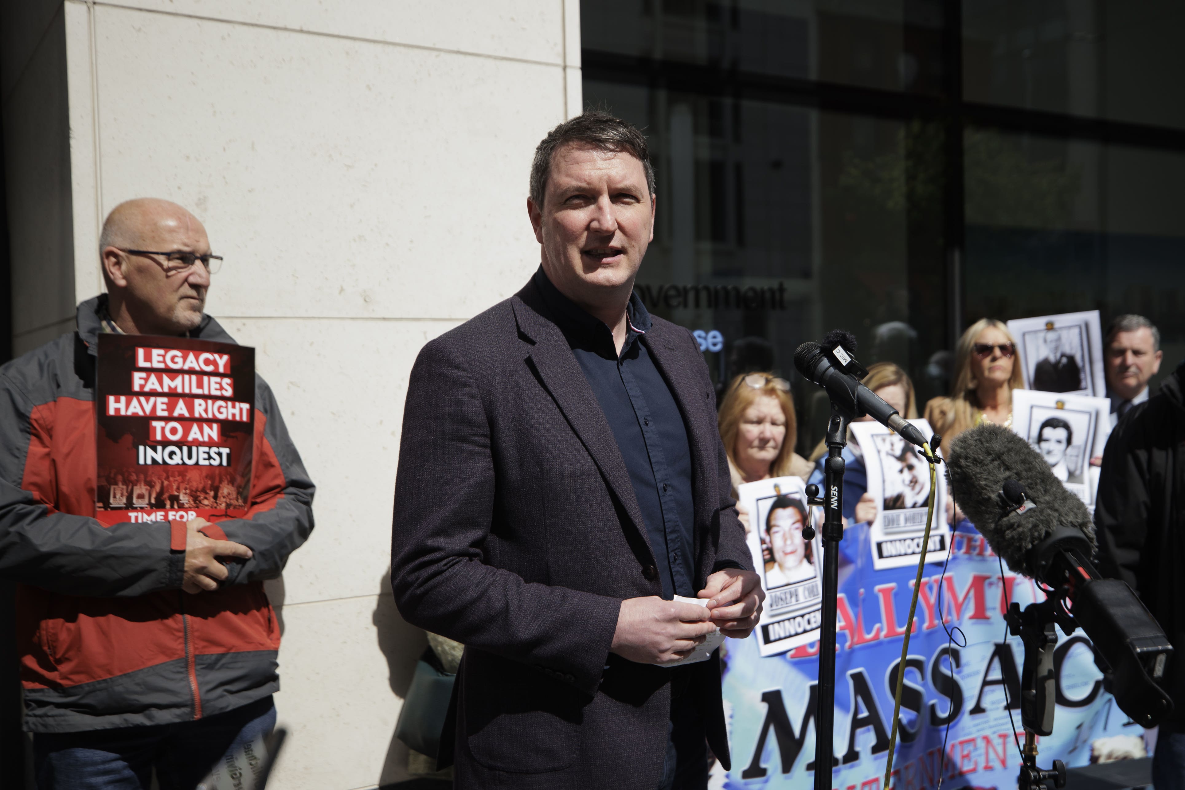 North Belfast Sinn Fein MP John Finucane speaks during a Time for Truth and Justice protest (Liam McBurney/PA)