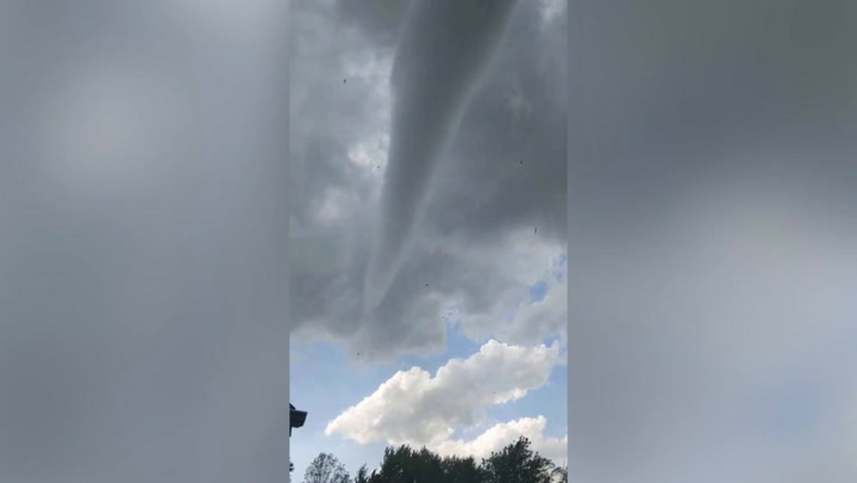 Gold Rimmed Tall Kansas Shot Glass Featuring A Tornado Kansas